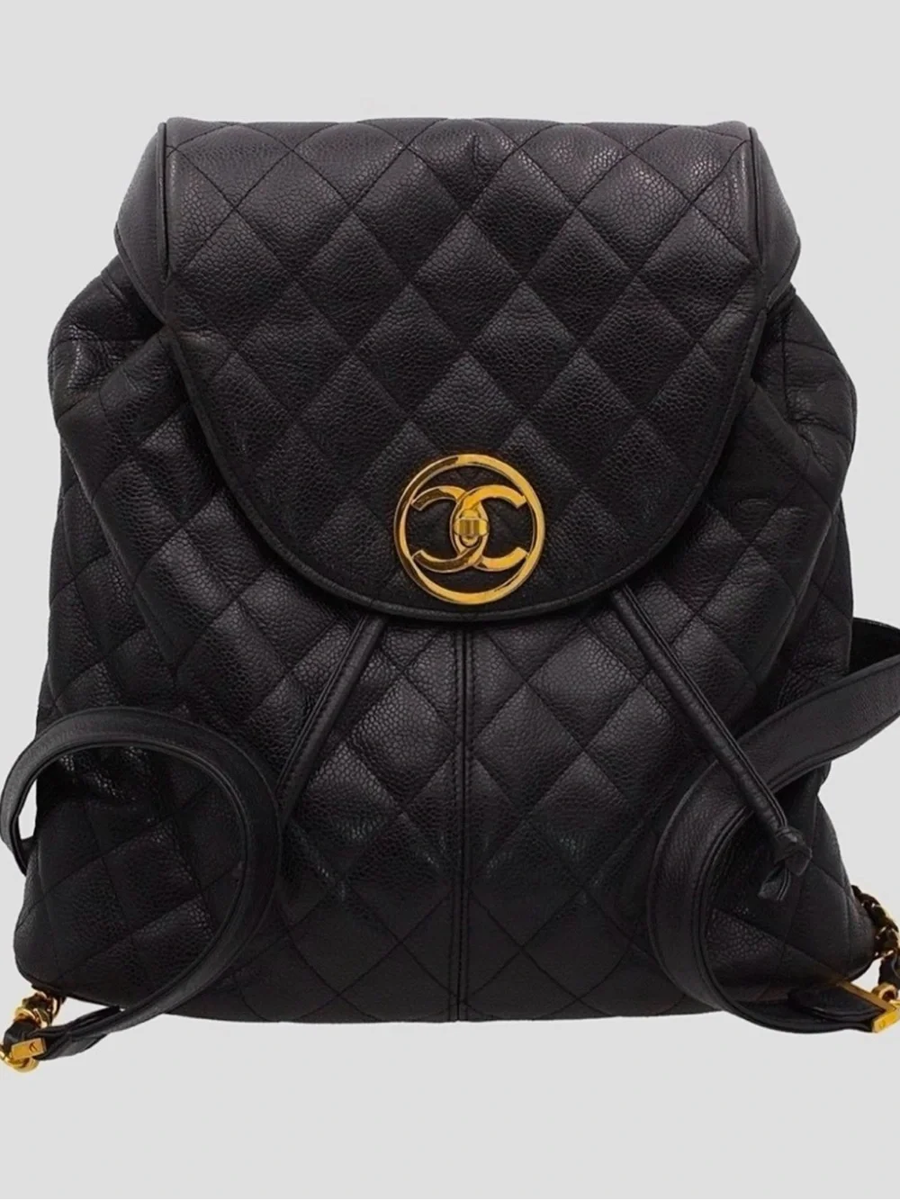 CHANEL Black Quilted Leather Backpack with Gold CC Accent